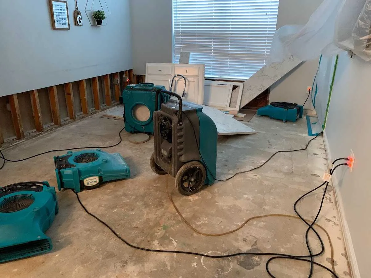 Dehumidifier in flood-cut room for Water Damage Restoration in Midland